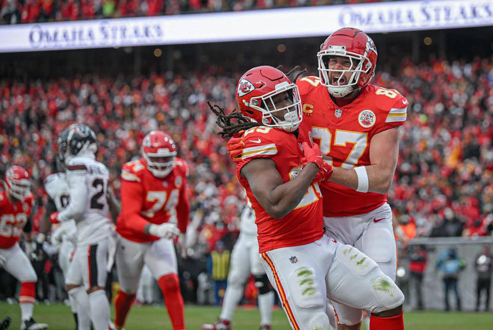 Running back Kareem Hunt (29) celebrates with Travis Kelce after scoring a touchdown in a divisional round playoff win against the Texans. (Tammy Ljungblad/The Kansas City Star/Tribune News Service via Getty Images)