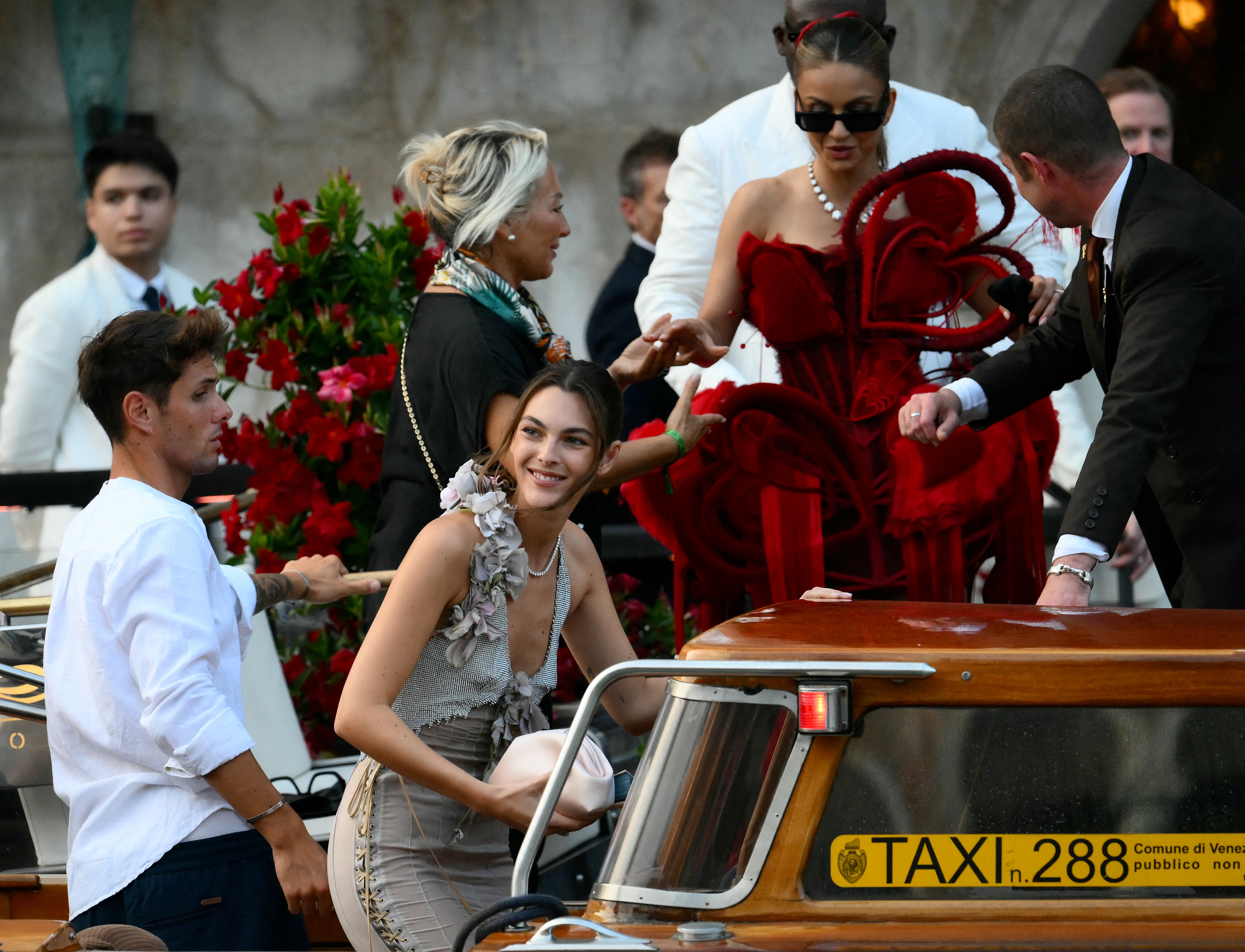 Indian businesswoman Natasha Poonawalla stepped out in a look that couldn’t help but quite literally stand out. She wore a red corset dress with a puffy skirt that had hoops on the side. There was also a giant heart on the front of it, so it’d be no surprise if Poonawalla’s look was the center of attention