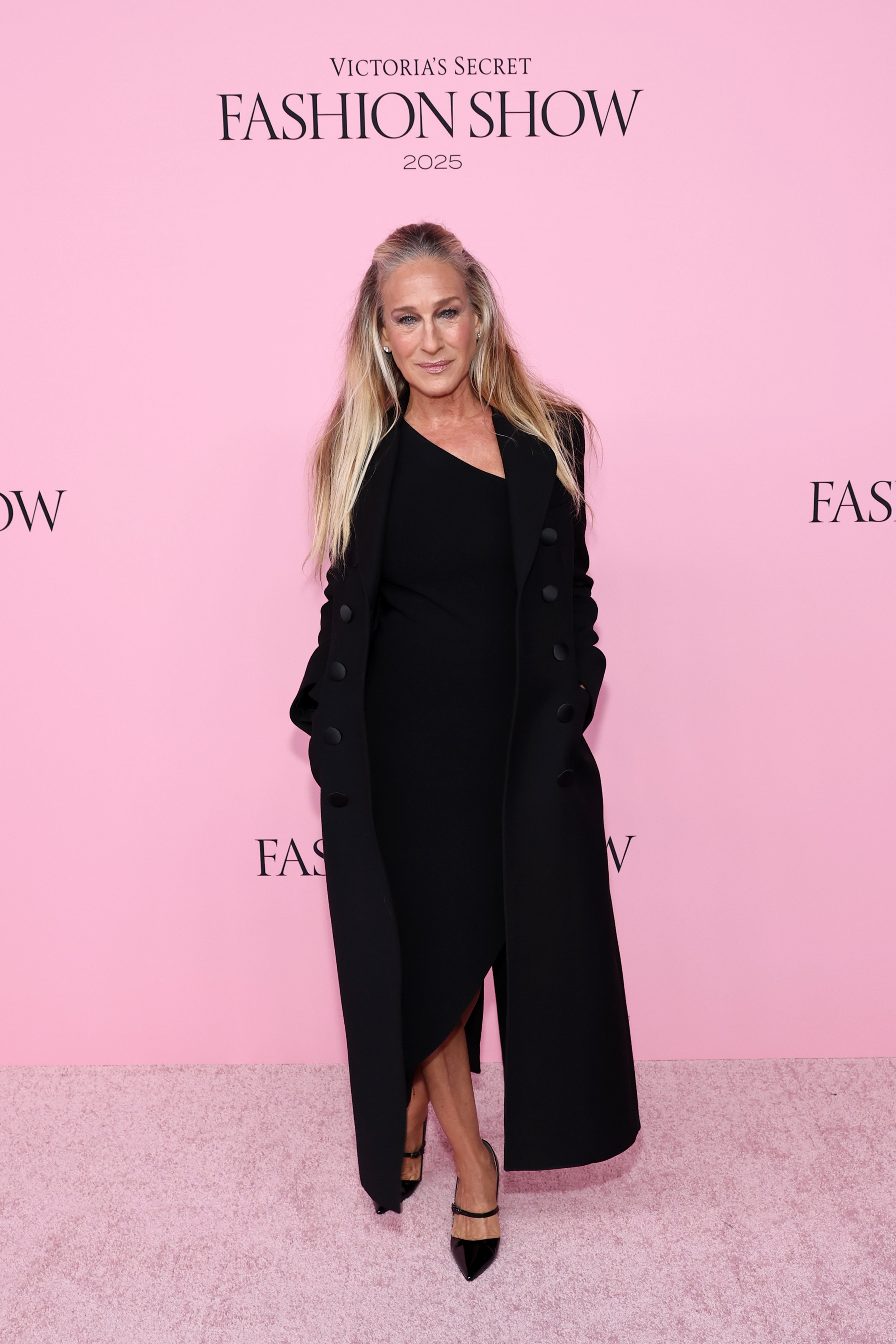 Fashion icon Sarah Jessica Parker opted for an all-black look on the Pink carpet. Her long blonde locks cascading down her back, Parker wore a one-shoulder asymmetrical Alexander Wang black dress paired with an oversized Dolce & Gabbana black coat and SJP black heels. Speaking on the Pink carpet, Parker said: ‘I’m not wearing anything. They’re pieces I’ve had in my closet forever’