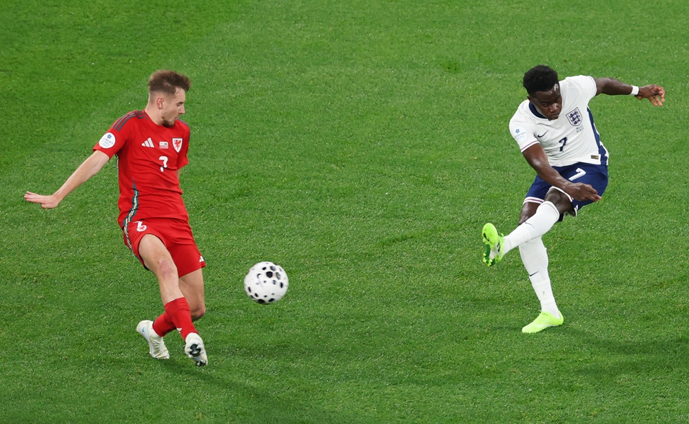 LONDON, ENGLAND: Bukayo Saka of England scores his team's third goal during the International Friendly between England and Wales at Wembley Stadium on October 09, 2025. (Photo by Justin Setterfield/Getty Images)